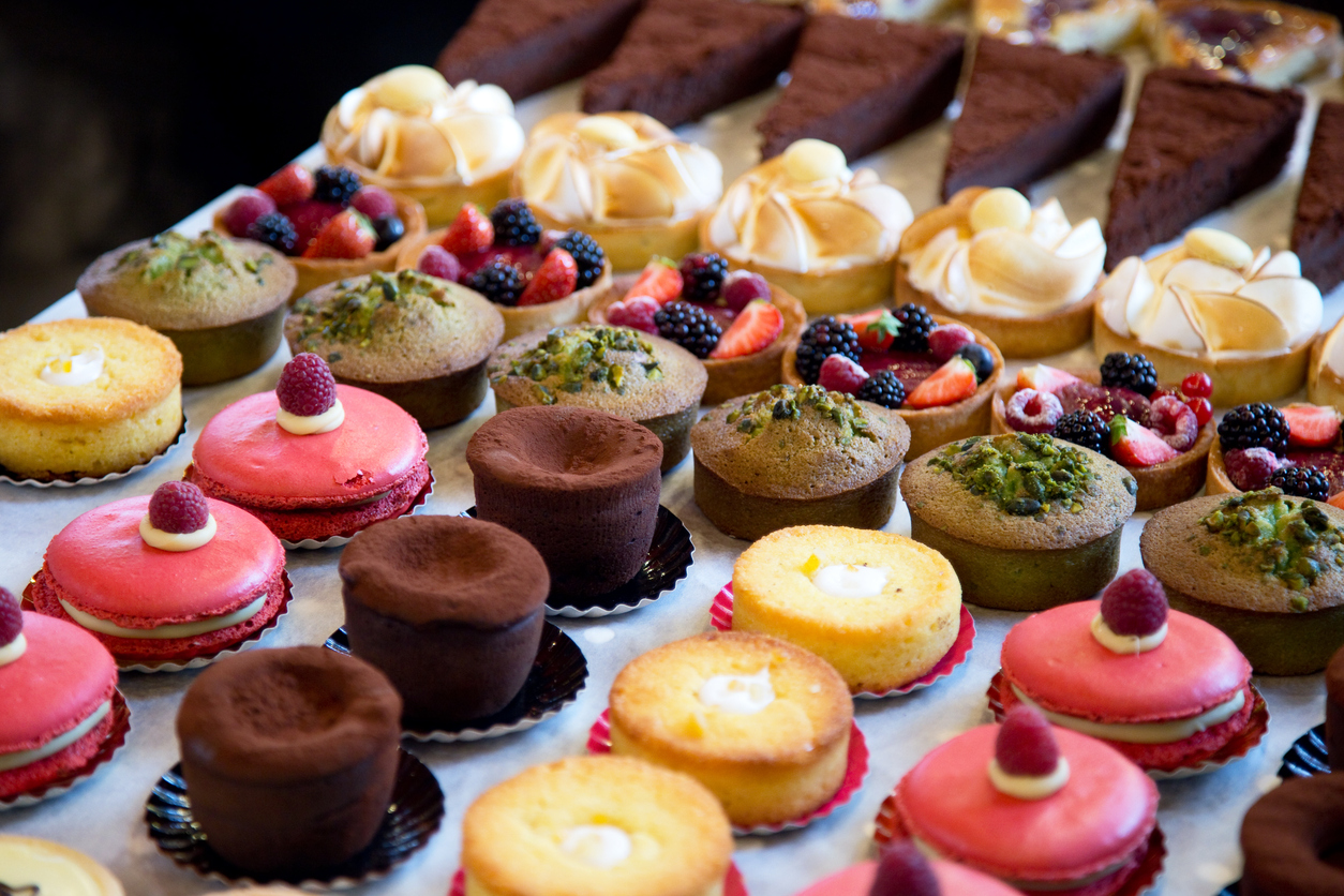 an assortment of cakes and pastries
