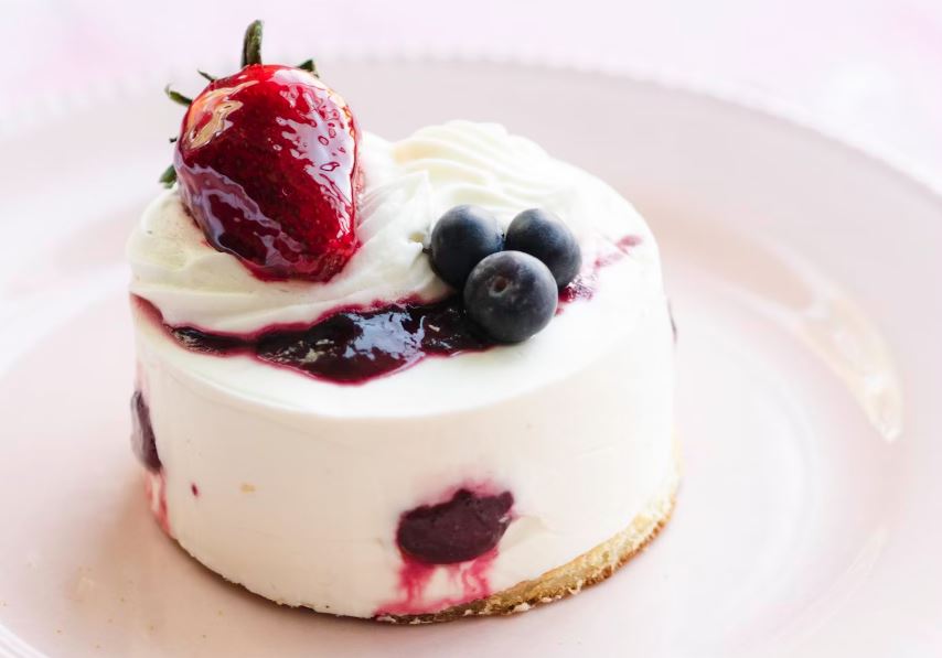 White and brown cake on white ceramic plate